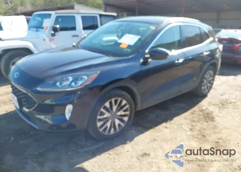 2021 Ford Escape Titanium z USA, uszkodzony, nr VIN 1FMCU9J91MUA57255